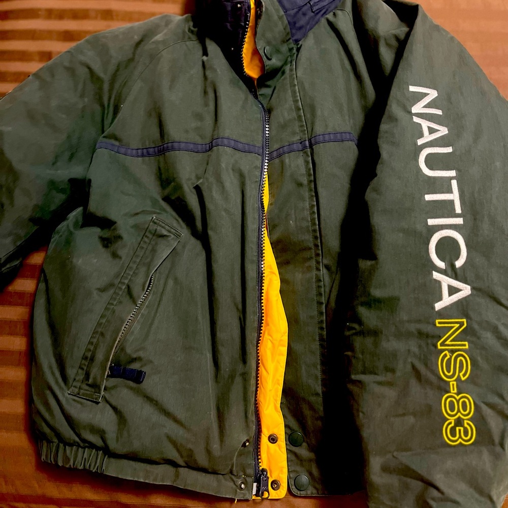 Nautica reversible puffer jacket. yellow on one side an green on the other.